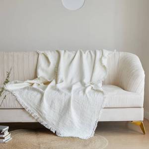 lot 201637 image: Simple&Opulence 100% Linen Throw Blanket 55x75 inches, Farmhouse Boho Tassel Blanket for Couch, Bed, Sofa, Breathable Natural Cozy D cor, White
