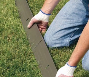 lot 132 image: 24ft x18 in. x 4 in. Black Aluminum Edging Kit Retails $80
