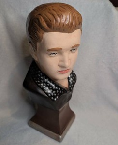 lot 521 image: Elvis Presely Head Bust with Black Jacket and Star Pattern Collar