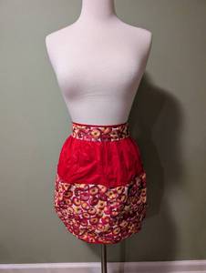lot 1057 image: Red Apron with Fruit Print Pockets and Waistband