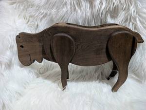 lot 2502 image: Novelty Pooping Wooden Cow Figurine with Storage Compartment  Marbles