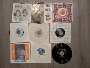 lot 3208 image: Lot of 7 45 RPM Records Elvis Presley Rick West Merle Haggard