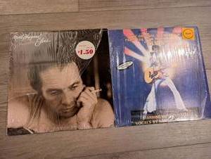 lot 3209 image: Lot of 2 Elvis Vinyl Records Merle Haggard My Farewell to Elvis Elvis Movie Soundtrack