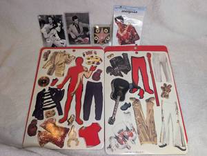 lot 5001 image: Elvis Presley Mix N Match Magnetic Dress-Up Wardrobe Toy