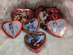 lot 5008 image: Russell Stover Heart-Shaped Tins with Movie Images Lot of 6