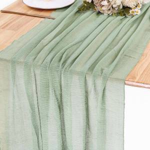 lot 917 image: SAJOO 13ft Sage Green Cheesecloth Table Runner Boho Gauze Table Runner 35x157 Inches Cheese Cloth for Wedding Baby Bridal Shower Party Summer Home Decorations - Retail $8