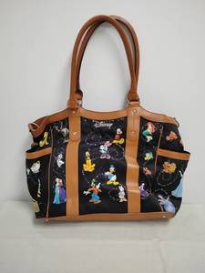lot 1 image: Disney Character large purse with Tan Handles Black Print
