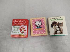 lot 34 image: Childrens Books Lot 3 Strawberry Shortcake Hello Kitty Twisted Whiskers Running Press