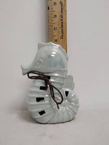 lot 65 image: Teal ceramic seahorse Scentsy holder