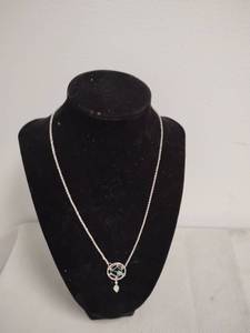 lot 74 image: Silver-Tone Pendant Necklace with Geometric Circle and Blue Stone