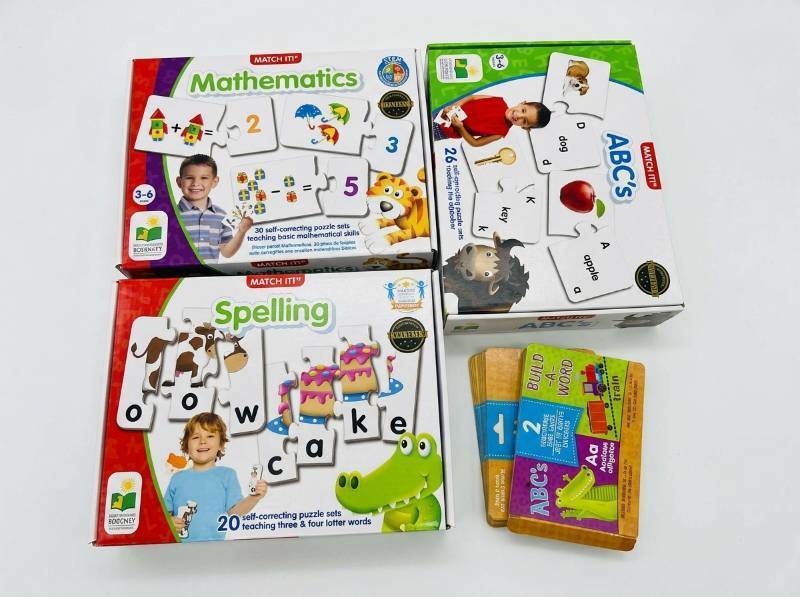 lot 3897 image: Match It Learning Puzzle Set - Math, Spelling & ABCs