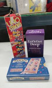 lot 4146 image: Lot of 3 Board Games UNO Stacko, Mancala, Lets Get Deep