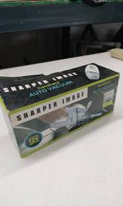 lot 4164 image: Sharper Image 12V Handheld Auto Vacuum