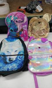 lot 4183 image: Lot of 4 Character Backpacks - Stitch, Mouse, Wolf, Cat