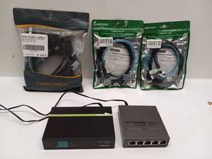 lot 6 image: Networking Switch Lot TrendNet PoE GreenNet NETGEAR ProSAFE Cables