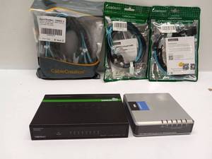 lot 10 image: Networking Lot TrendNet TEG-S80g Switch CableCreation Cables CableDeacon Adapters