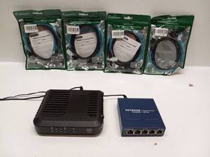 lot 12 image: Cisco DPC3008 DOCSIS 3.0 Cable Modem, NETGEAR GS105 5-Port Switch, 4x CableDeconn Cables