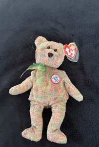 lot 6549 image: Multicolored Plush Teddy Bear with Tag ENCASED- Retail $0