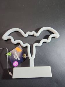 lot 71112 image: Neon Light Sculpture Bat Shape LED Tabletop Light - Retail $8