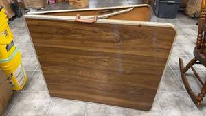 lot 22 image: Folding Table w Faux Wood Grain Top & Aluminum Frame (72 x 30)