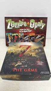 lot 33 image: Lot of 2 Zombie-Themed Board Games Zombie Apocalypse Board Game & World War Z The Game