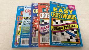 lot 87 image: Lot of 5 Crossword Puzzle Books - PennyPress Dell 2004-2005