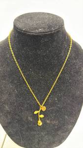 lot 93 image: Gold-Tone Chain Necklace with Rose Pendant and T Charm