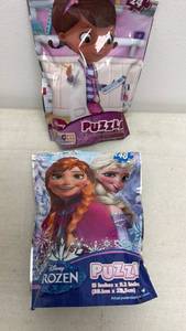 lot 116 image: Disney Puzzle Lot 2 Frozen 48pc Doc McStuffins 24pc