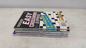 lot 120 image: PennyPress Crossword Puzzle Books Lot of 5