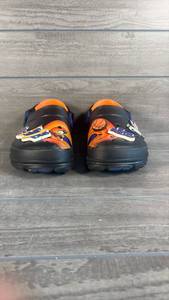 lot 151 image: Crocs Kids Clogs Space Jam Basketball Themed Orange Black Blue Pair
