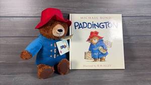 lot 182 image: Paddington by Michael Bond Illustrated Book with Plush Bear
