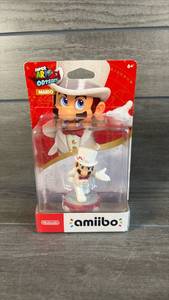 lot 199 image: Nintendo amiibo Super Mario Odyssey Mario Wedding Outfit Figure