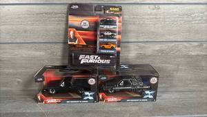 lot 249 image: Jada Fast & Furious Die-Cast 4-Piece Set NV-11 1967 Chevrolet El Camino Dodge Charger