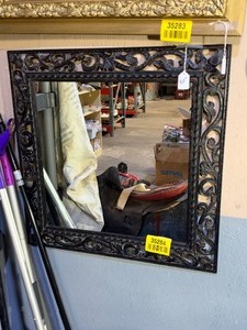 lot 35284 image: Ornate Squared Wall Mirror With a Dark, Intricately Carved Scrollwork Frame.