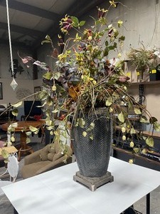 lot 35200 image: Large artificial plantfloral in a black and gold vase