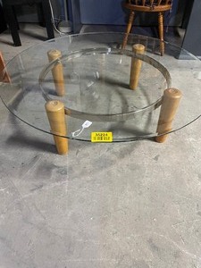 lot 35224 image: Round glass accent Coffee table with 4 wood legs