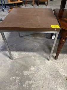 lot 35228 image: Accent table with wood top, metal frame, and legs