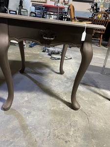 lot 35229 image: Bronze brown accent table with a single drawer