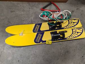 lot 35174 image: A Pair of Cypress Gardens Yellow trainer water skis, ski rope