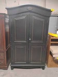 lot 35179 image: Wooden armoire with open double doors, upper hangingshelving space and a lower section with a pull-out shelf and two drawers.