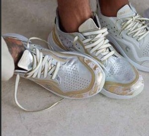 lot 10008 image: Courser Uno Mens SilverGold Sneakers Size 11.5  Retail $595