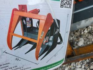 lot 4035 image: Handy Skid Steer Grapple Saw  HZMJ26
