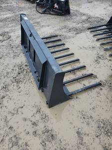 lot 615 image: Wolverine X-Treme Skid Steer Manure Forks  64