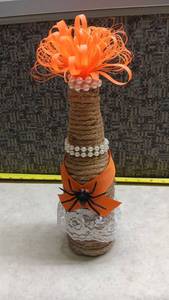 lot 1513 image: Orange Decor with Spider Bow