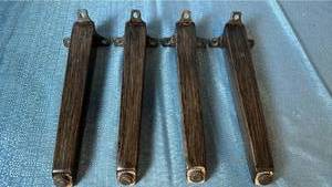 lot 2007 image: Lot of 4 Brown Metal Furniture Legs.