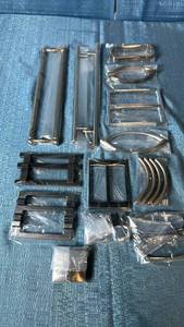 lot 2014 image: Assortment of Chrome and Silver Drawer or Door Handles.