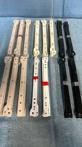 lot 2064 image: Lot of 15 Black, White and Off White 12 Drawer Glide Sets.