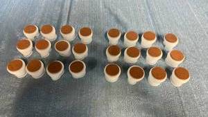 lot 2070 image: Lot of 24 Translucent 1.5 Chair Leg Caps.