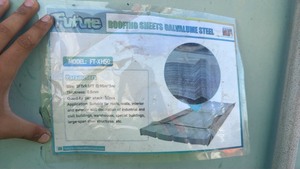 lot 8046 image: Unused Future FT-XH50 Galvalume Steel Roofing  Siding - 10 ft, 50 Sheets - Damaged