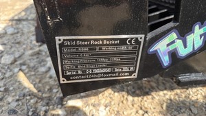 lot 8118 image: Unused Future FT-RB66N Skid Steer Rock Bucket Without Teeth - 66 Inch